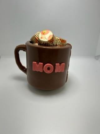Milk chocolate mug filled with Peanut Butter Cups